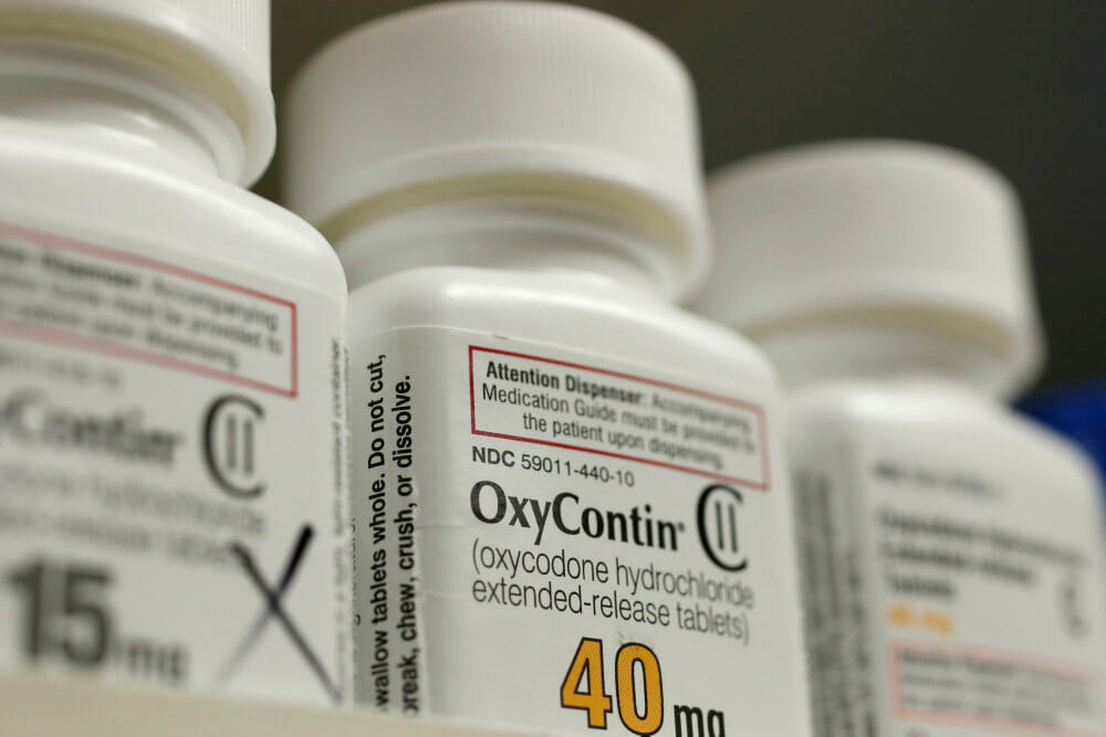 Read more about the article Medicinalfirma overvejer kæmpe milliardforlig i opioid-sag